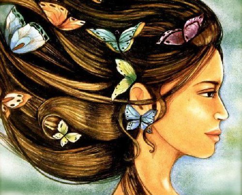 Mujer con mariposas en el pelo